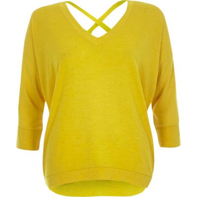 Yellow knitted V-neck cross back jumper